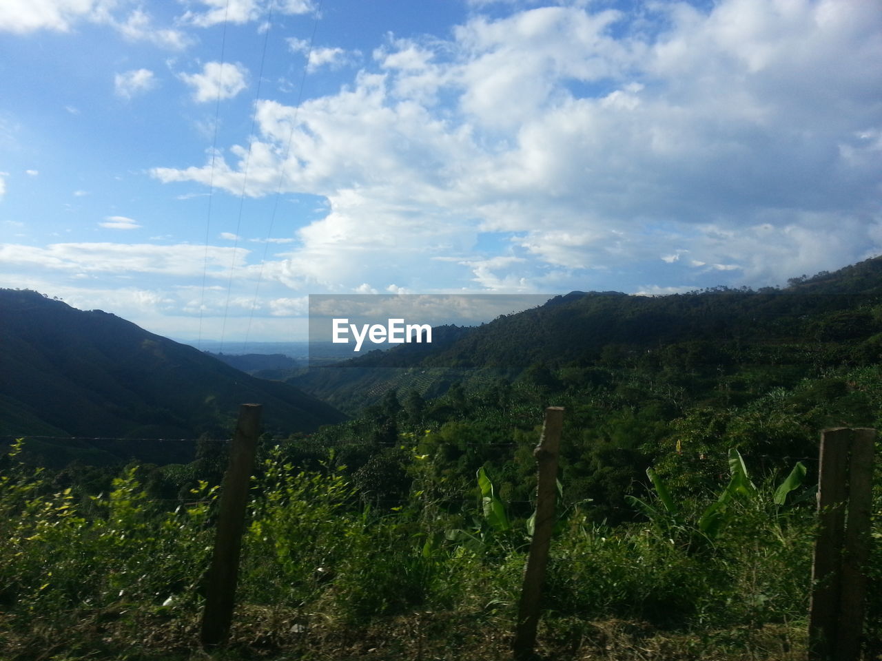 View of landscape against cloudy sky