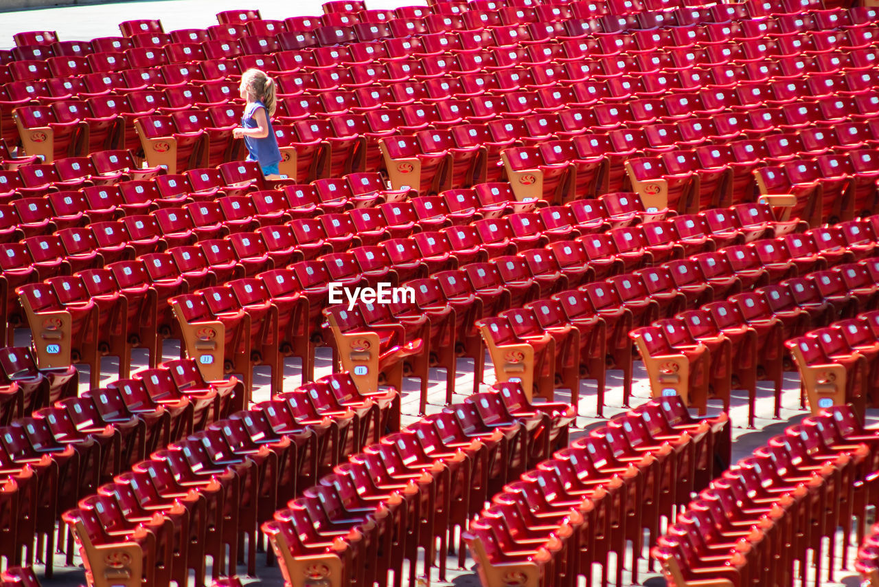 HIGH ANGLE VIEW OF RED WINE BOTTLES ON DISPLAY