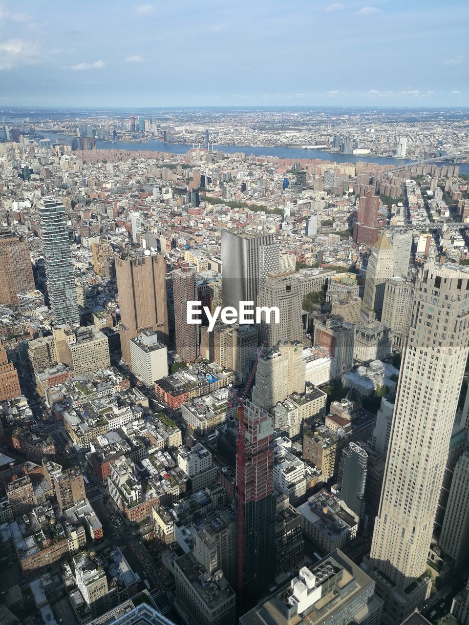 HIGH ANGLE VIEW OF MODERN BUILDINGS AGAINST SKY