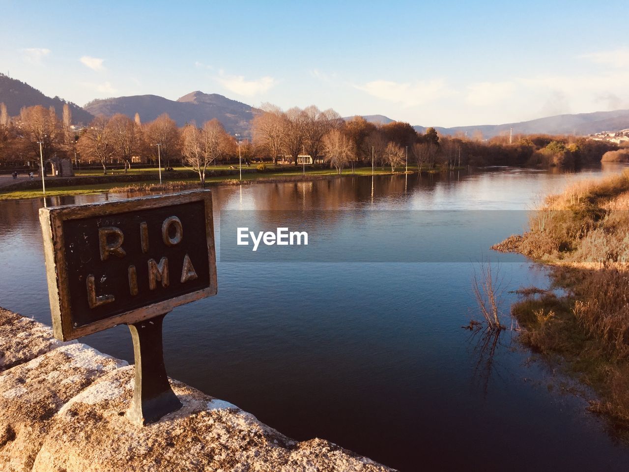 TEXT ON LAKE AGAINST SKY