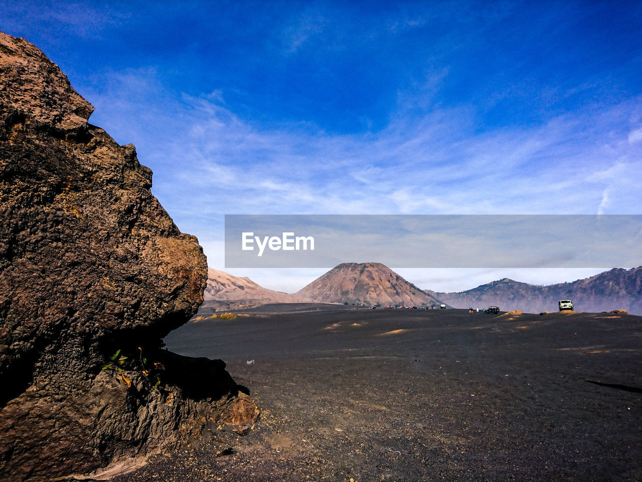 Scenic view of landscape and mountains against sky