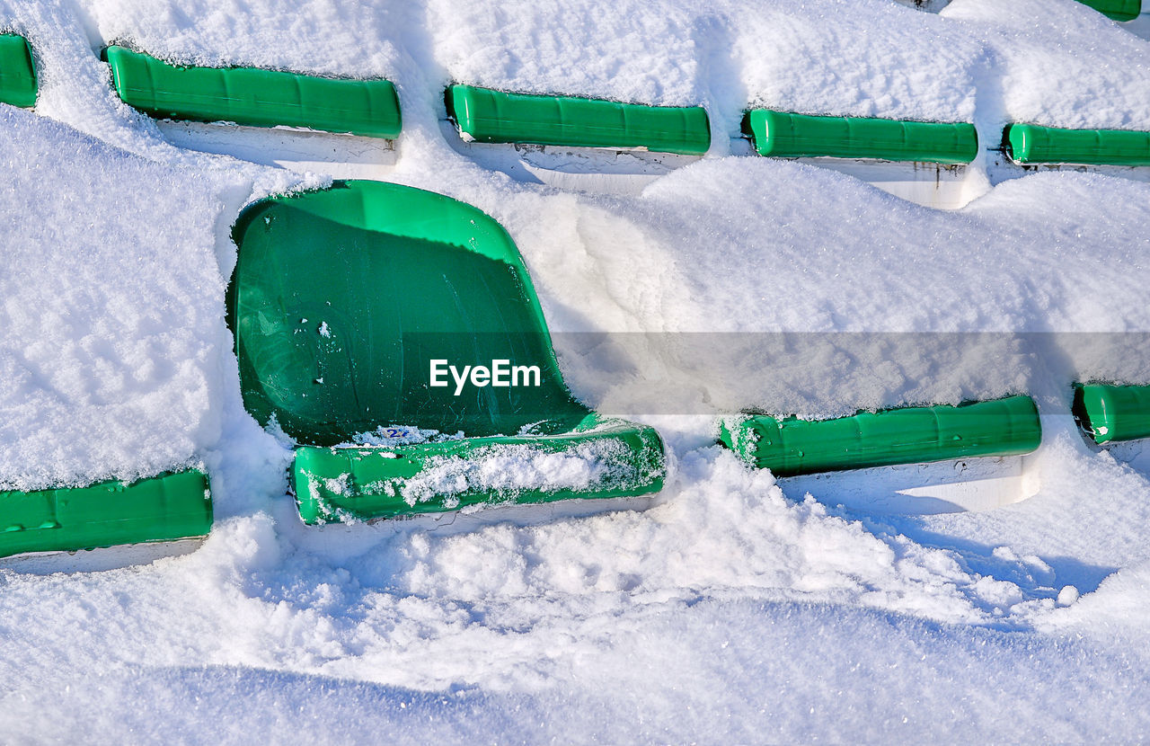 HIGH ANGLE VIEW OF SNOW ON SEA DURING WINTER