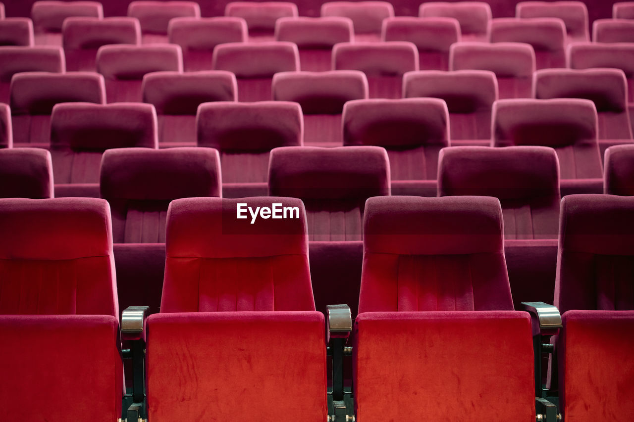 full frame shot of empty seats in stadium