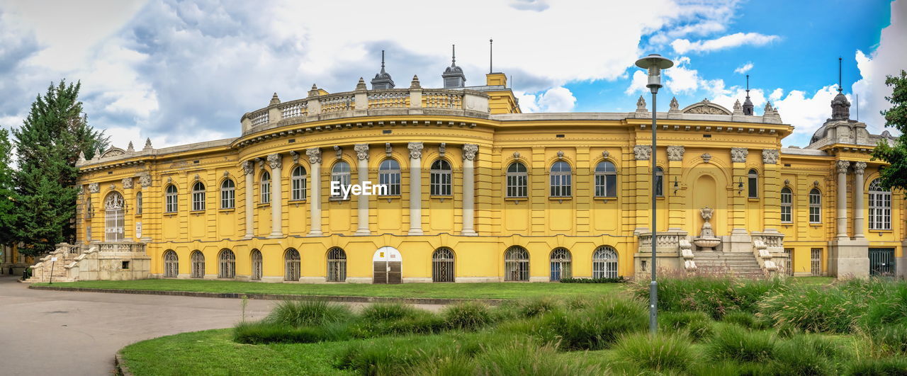 Thermal szechenyi medicinal bath in budapest, hungary, on a sunny summer morning