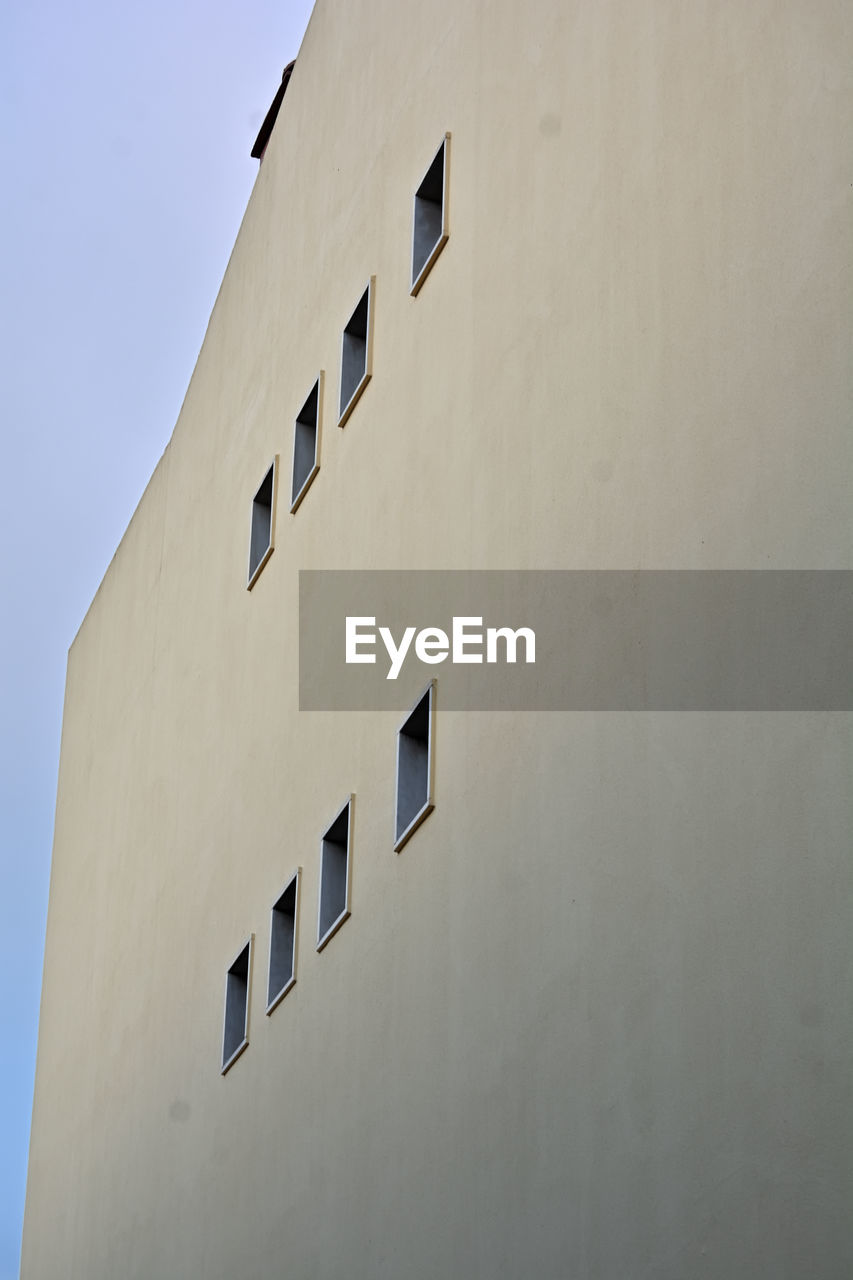 Low angle view of building against clear sky