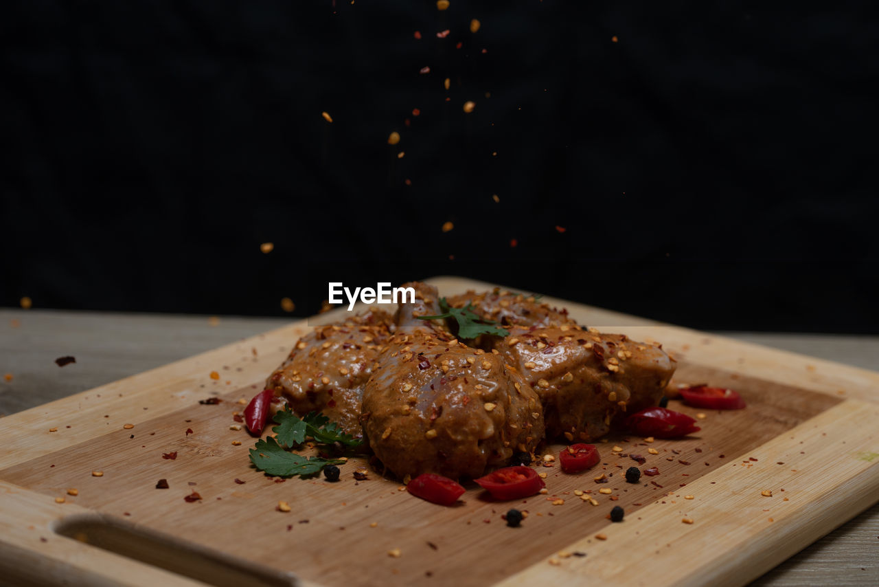 CLOSE-UP OF FOOD ON TABLE