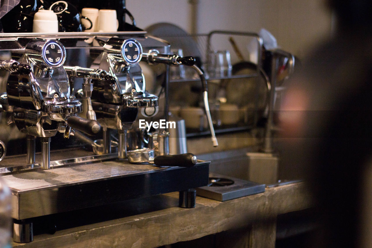 Espresso maker in cafe