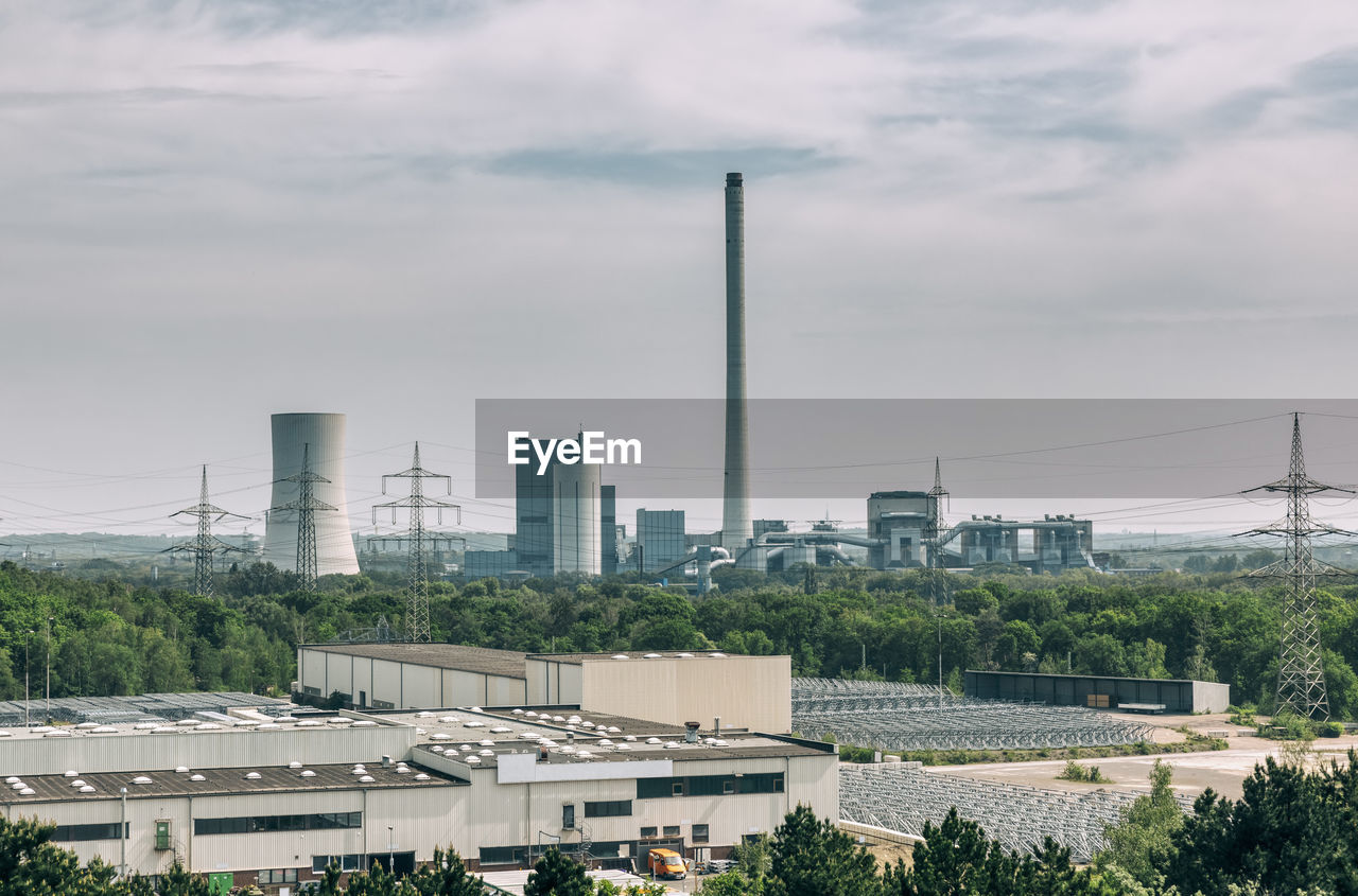 VIEW OF FACTORY AGAINST SKY