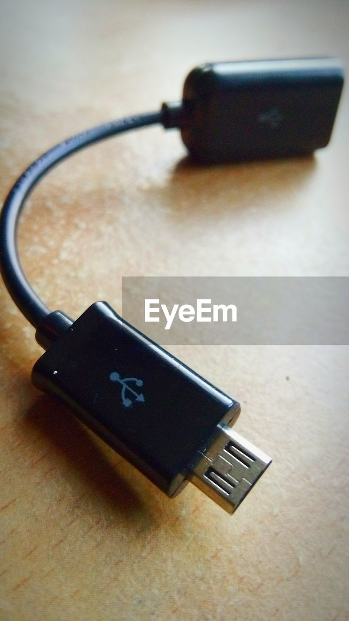 Close-up of usb cable on table