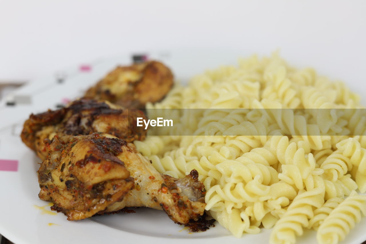 food, food and drink, dish, freshness, cuisine, plate, healthy eating, wellbeing, indoors, meat, fried food, no people, produce, close-up, italian food, meal, vegetable, chicken meat, pasta, chicken