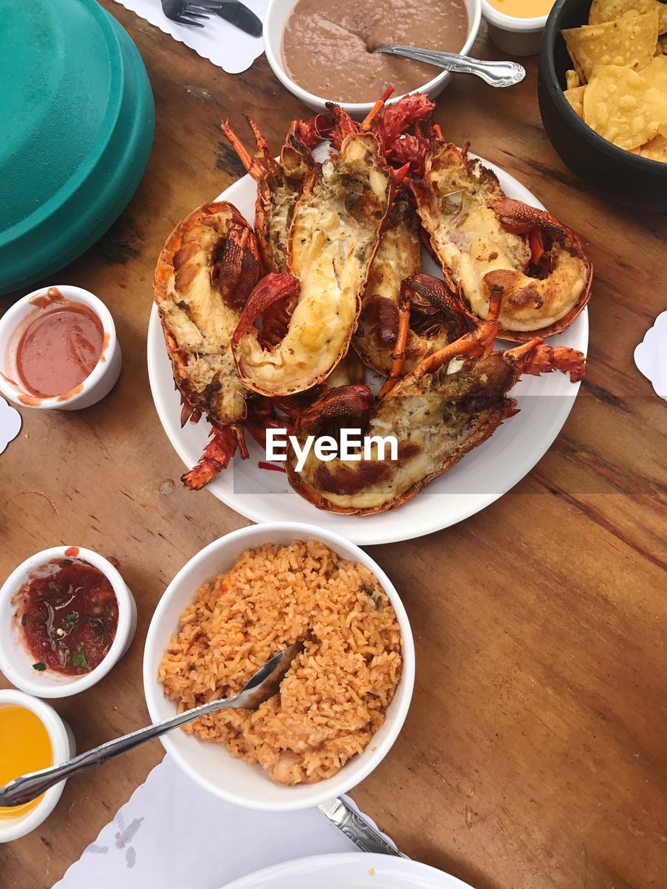 High angle view of food served in bowls and plate on table