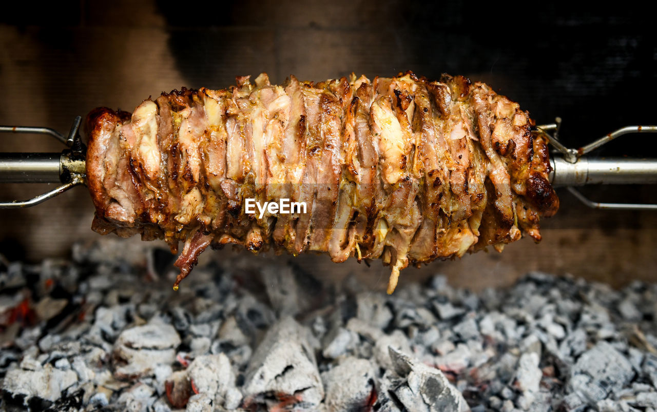 High angle view of meat on barbecue grill