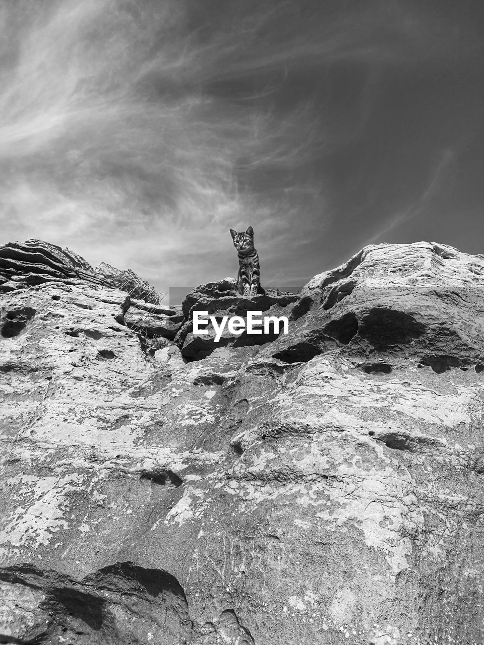 LOW ANGLE VIEW OF STONES ON HILL