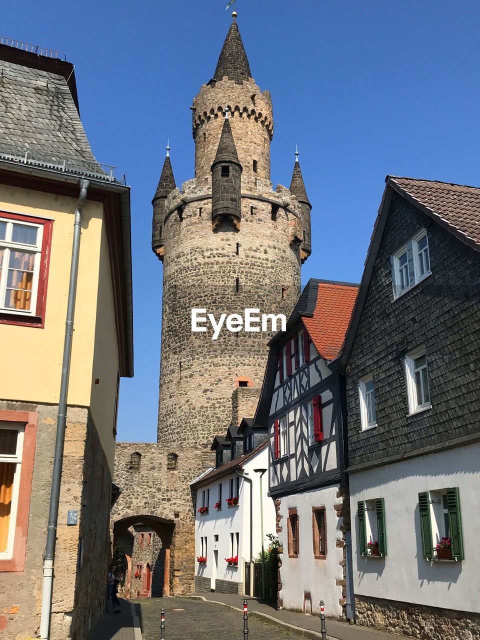 Low angle view of buildings against blue sky