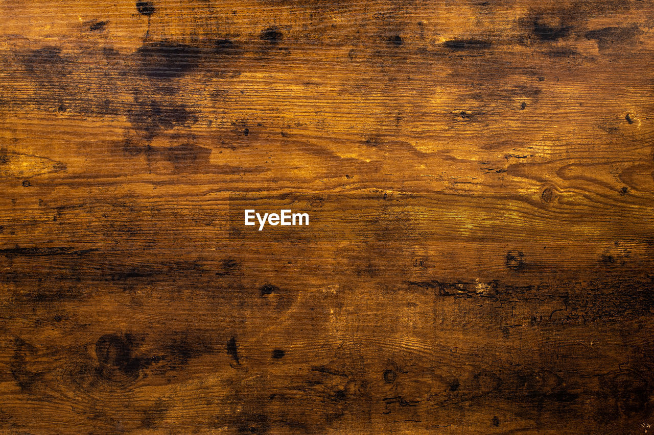 Close up details of vintage aged dark wood board texture background