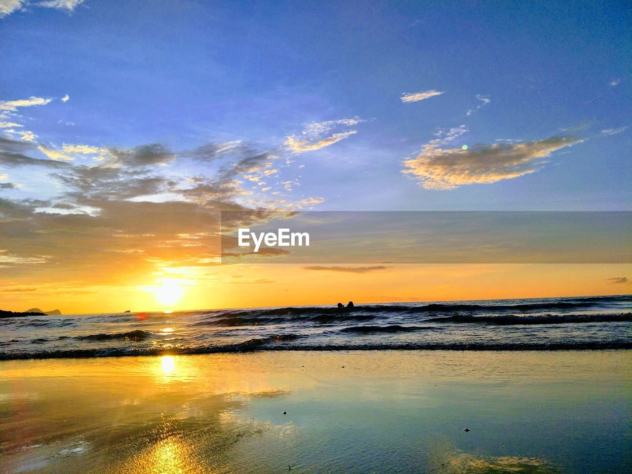 SCENIC VIEW OF SEA DURING SUNSET