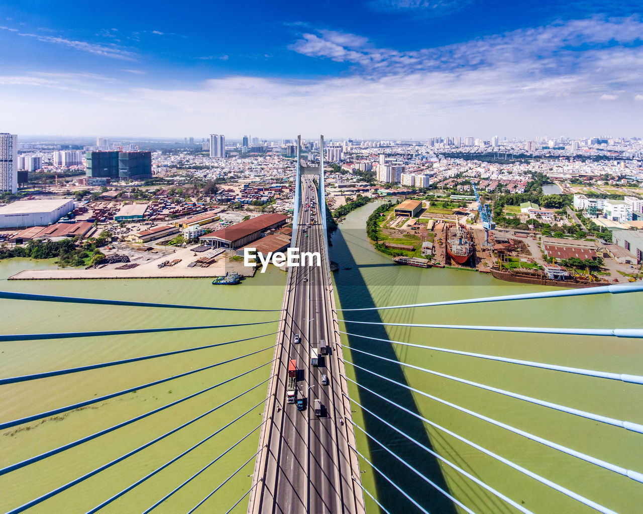 High angle view of phu my bridge over river in city against sky