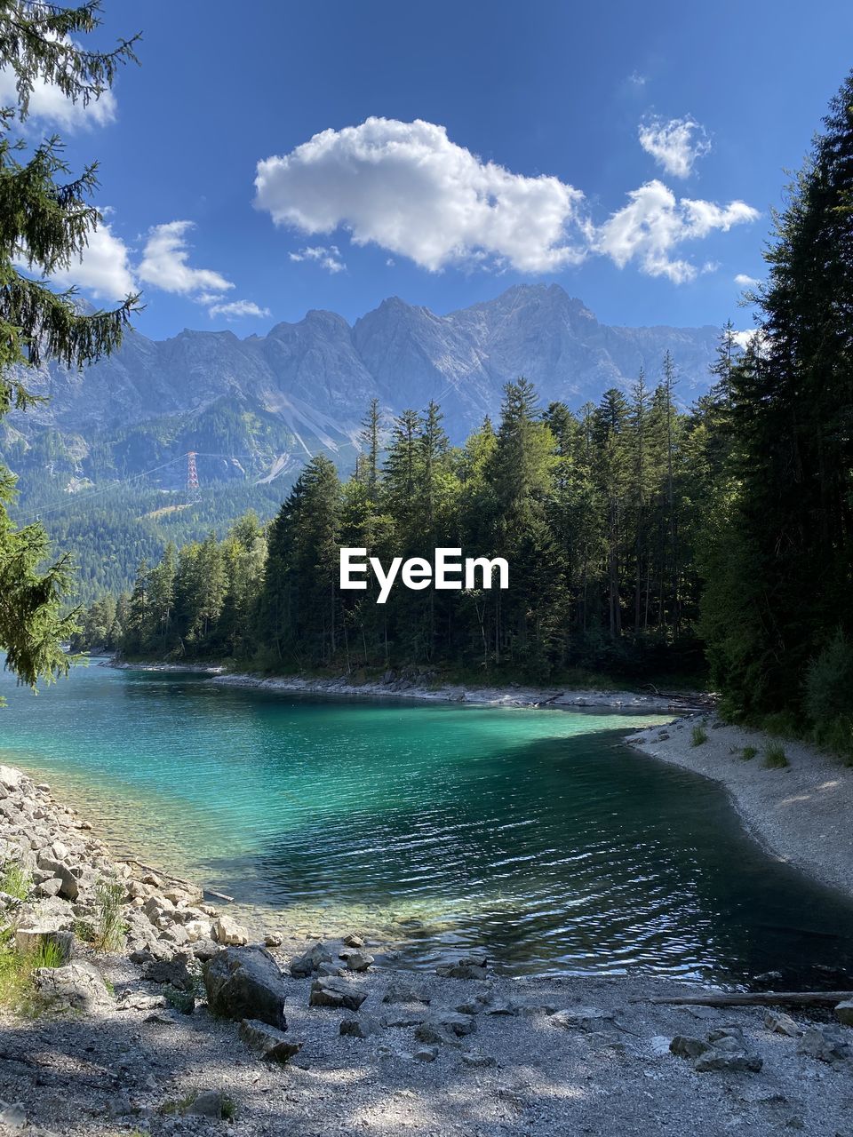 Panoramic view of waterfall against sky