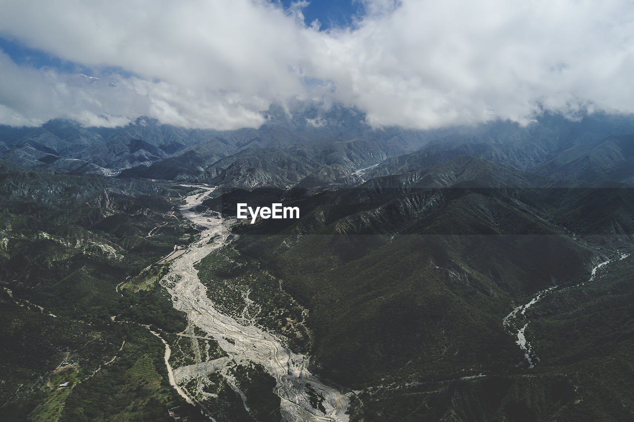 Aerial view of mountains against sky