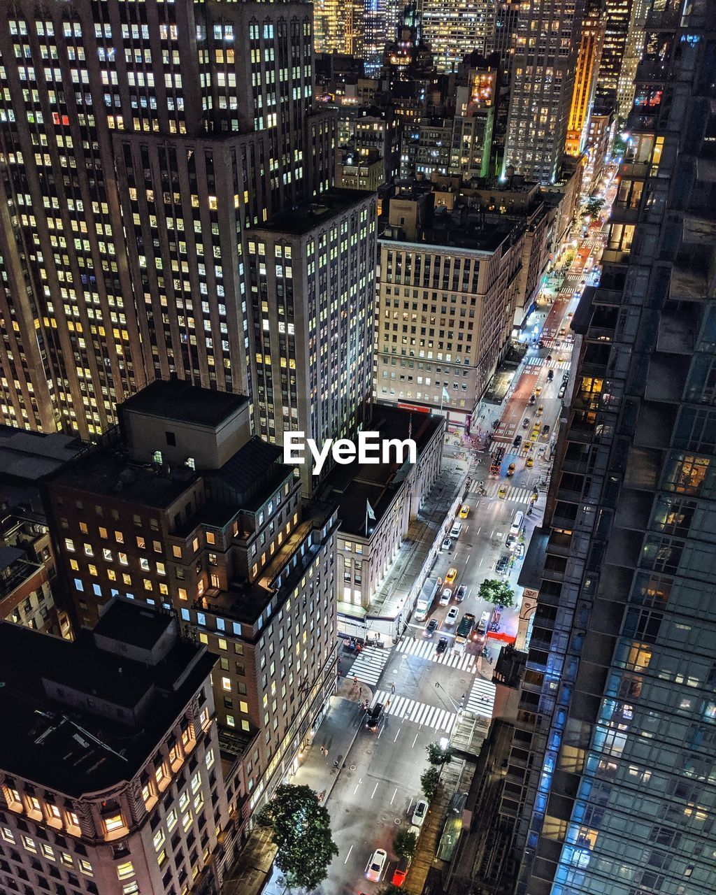 Modern buildings in city at night