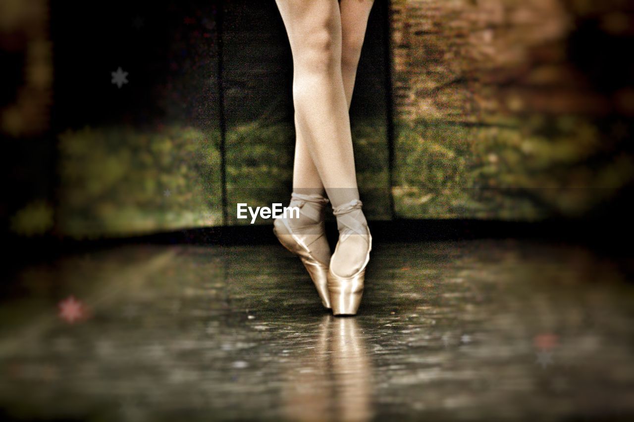 Low section of ballet dancer on stage