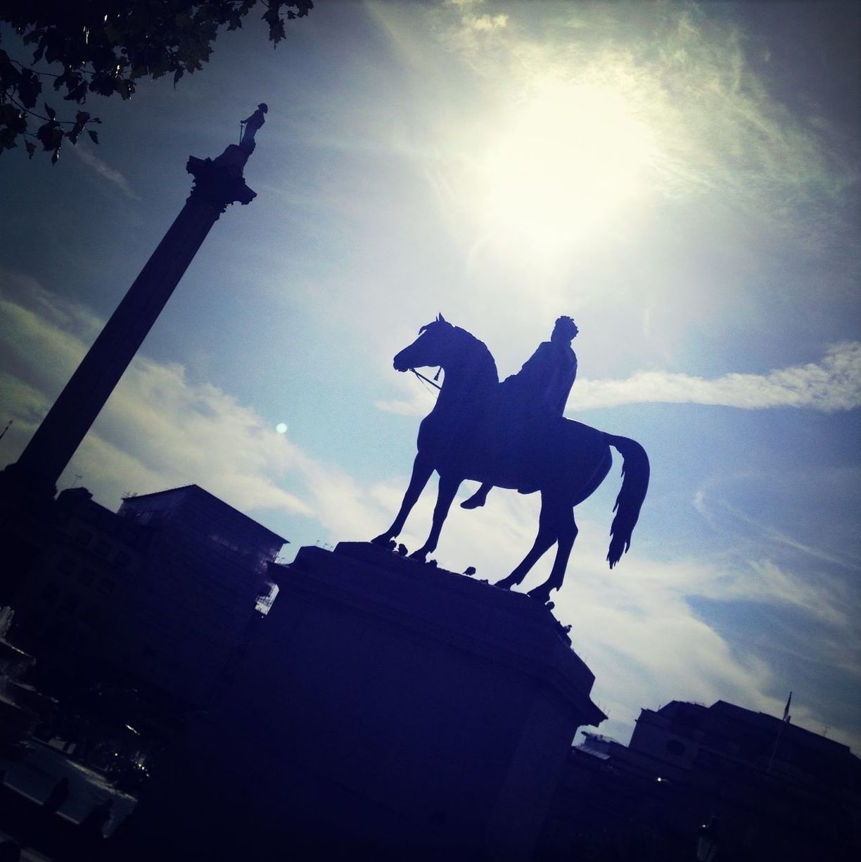 Statue of man riding horse