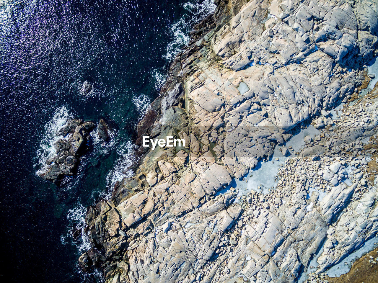 High angle view of rocky shore