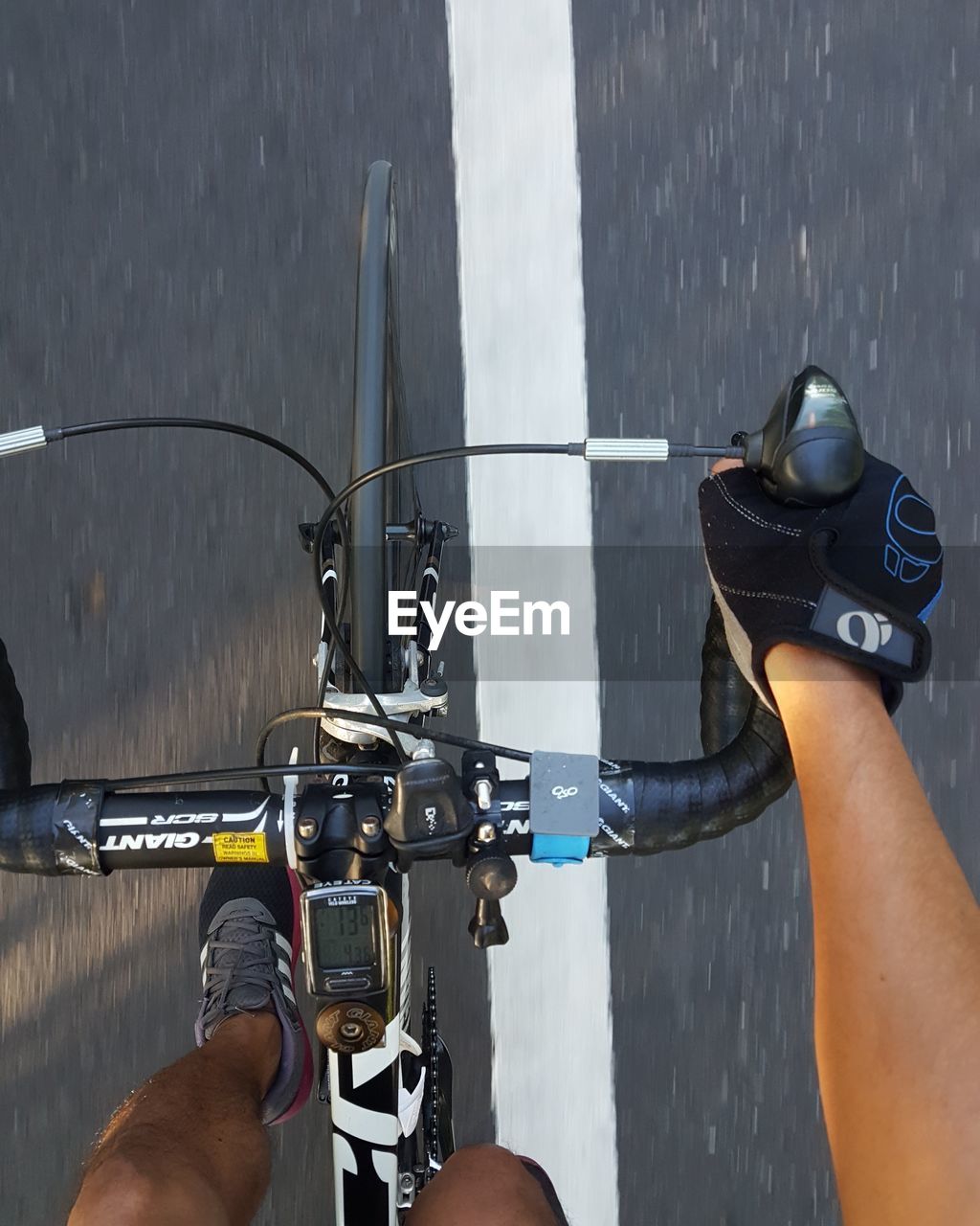 MAN RIDING BICYCLE