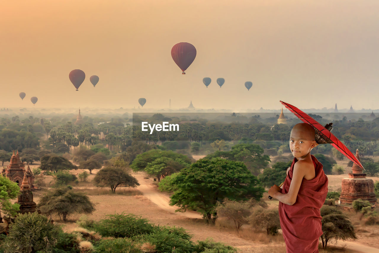 SCENIC VIEW OF HOT AIR BALLOONS AGAINST SKY