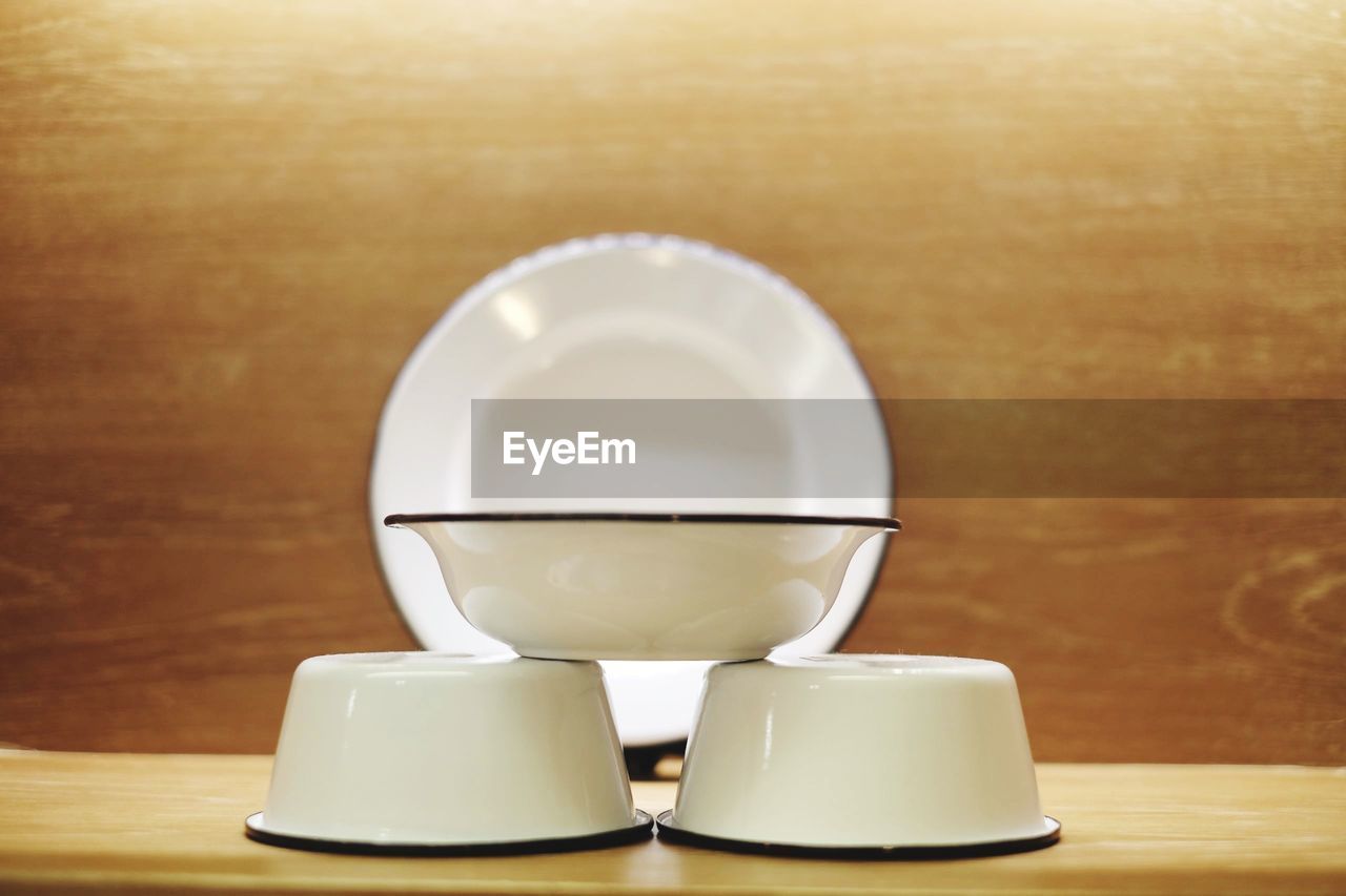 Close-up of bowls on table