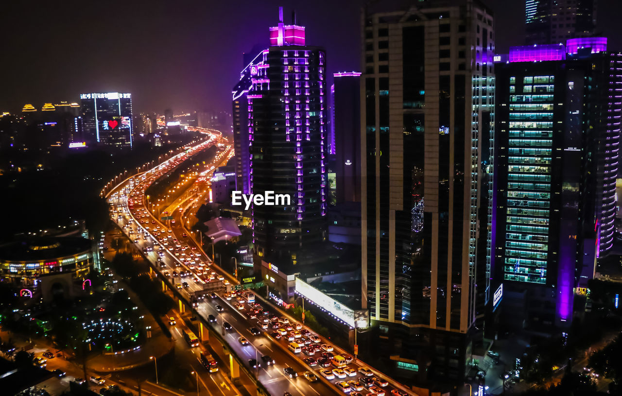 High angle view of illuminated city at night