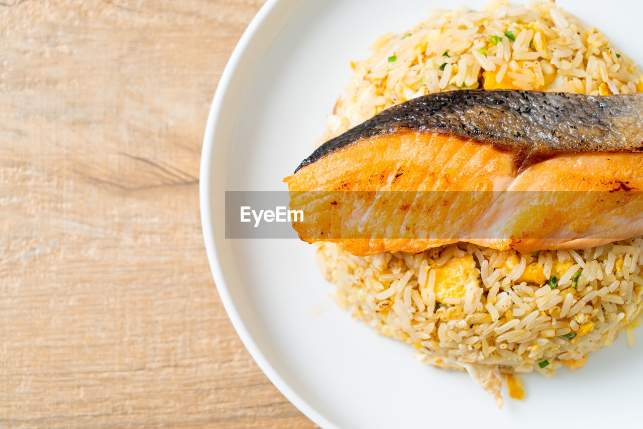 food and drink, food, healthy eating, fish, freshness, dish, wellbeing, plate, produce, meal, rice - food staple, indoors, wood, no people, seafood, vegetable, cuisine, table, rice, close-up, breakfast, high angle view, asian food, studio shot