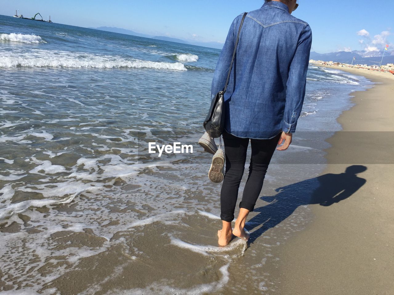 LOW SECTION OF MAN ON BEACH