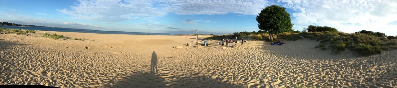 Panoramic view of beach against sky