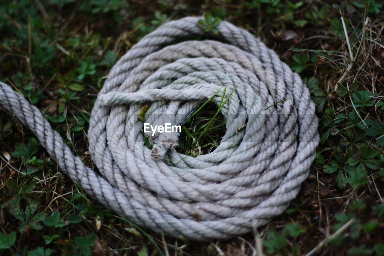 High angle view of rope on land