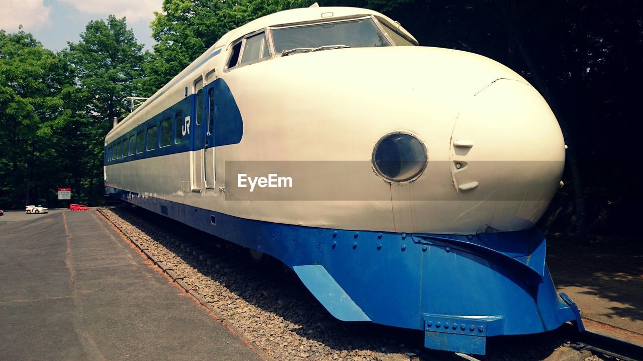 VIEW OF TRAIN ON ROAD