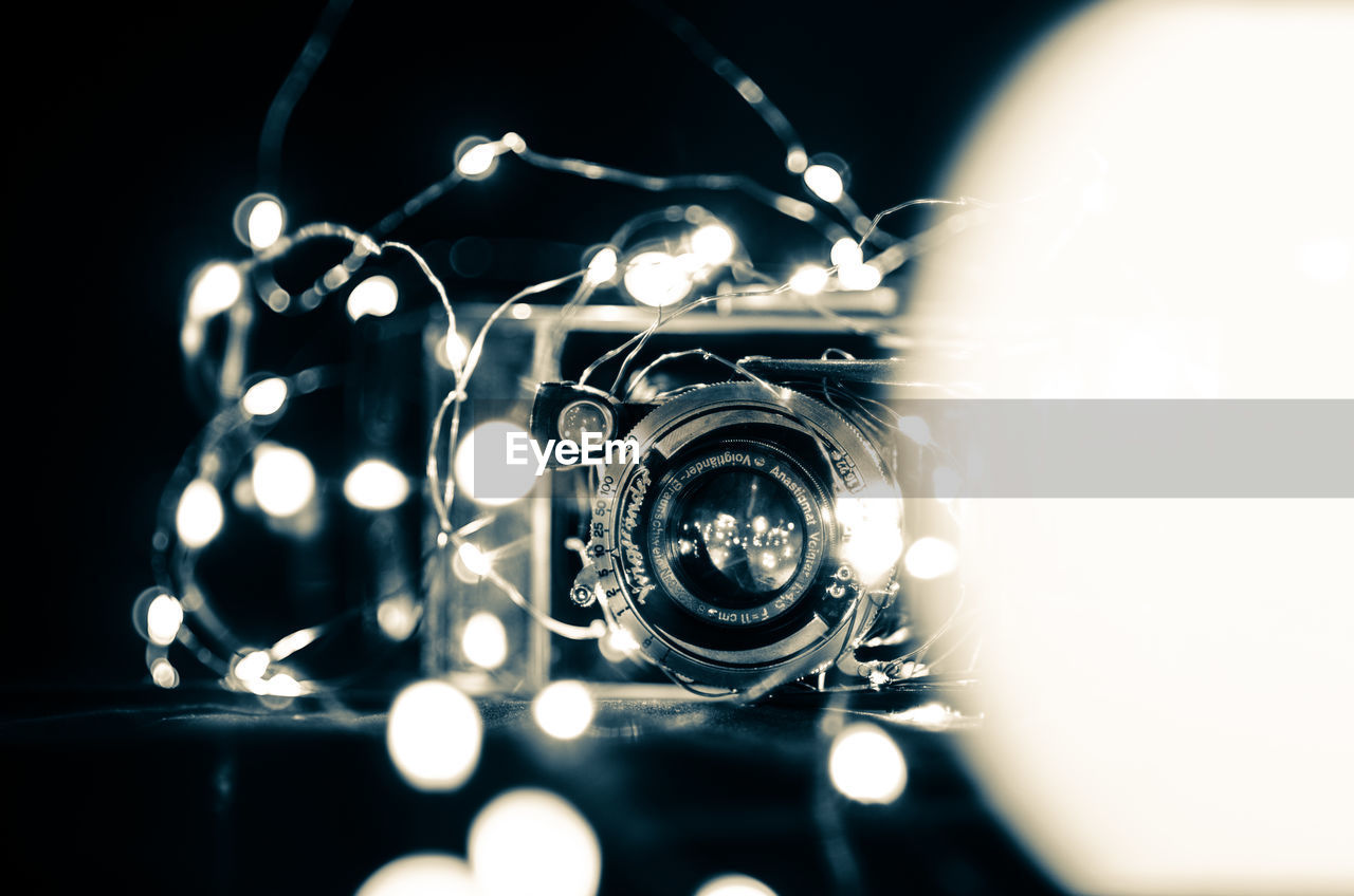 CLOSE-UP OF CAMERA ON TABLE