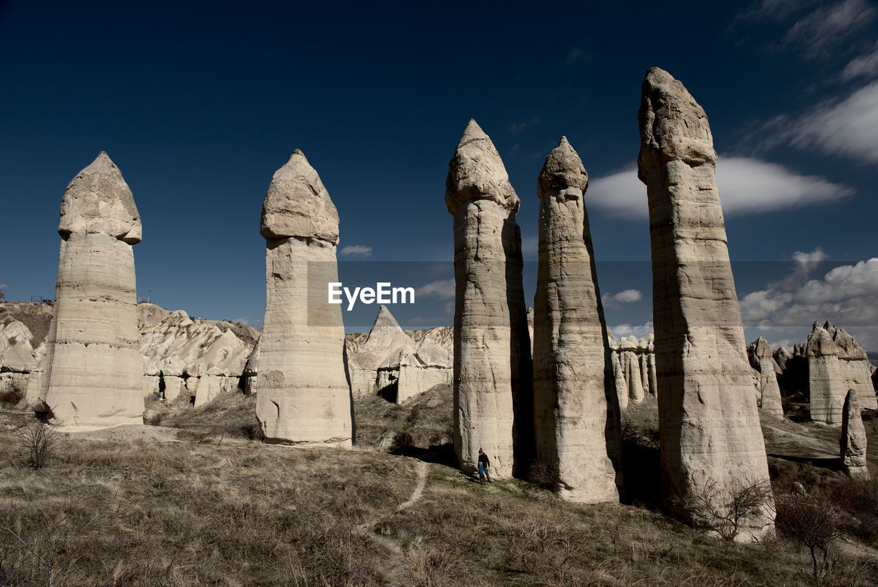 Low angle view of love valley cappadocia against sky