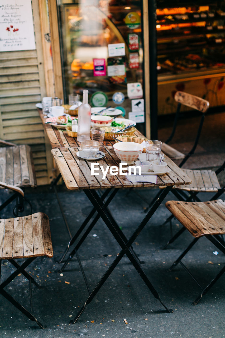 TABLE AND CHAIRS AT CAFE