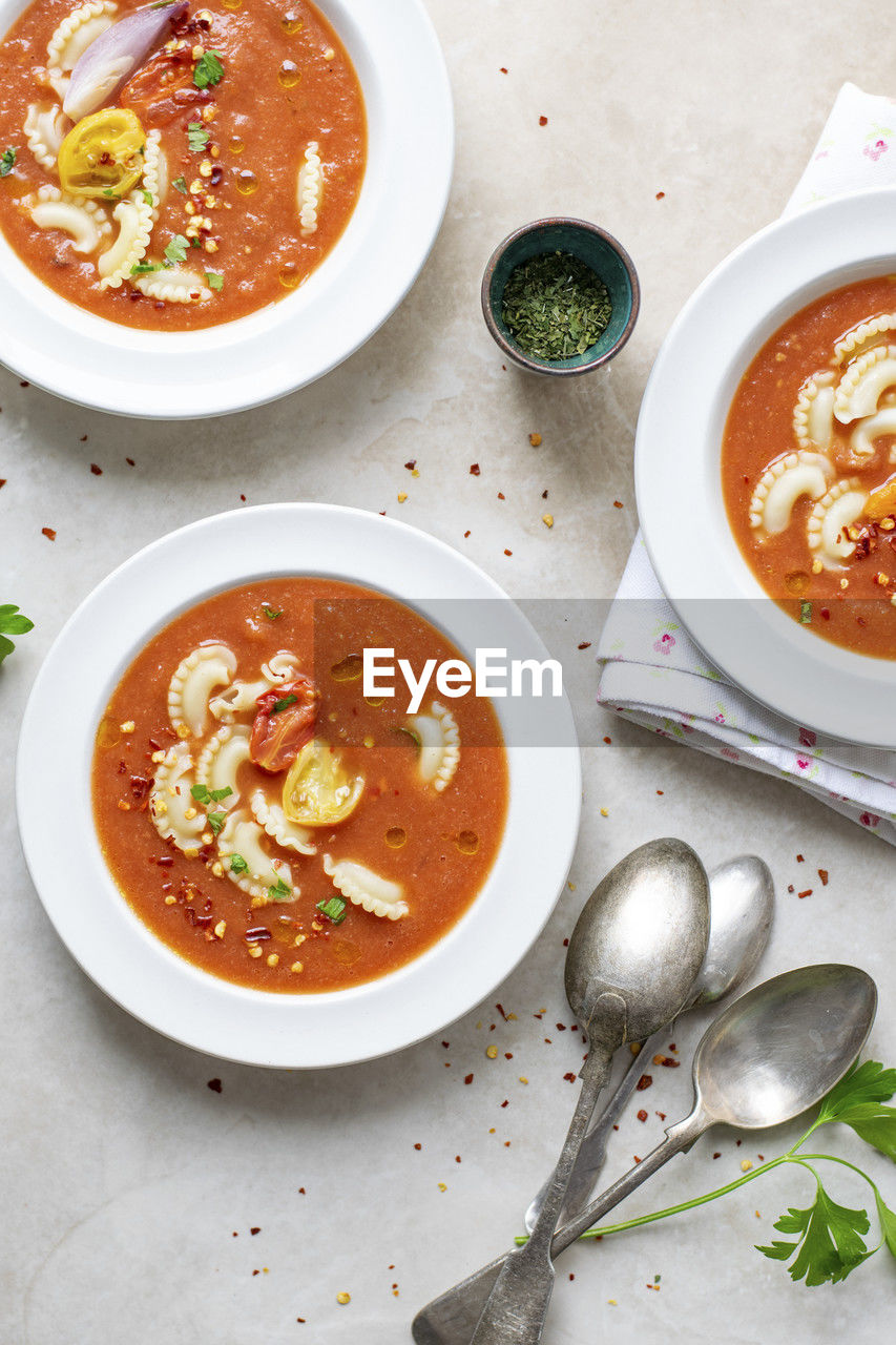 high angle view of soup in bowls on table