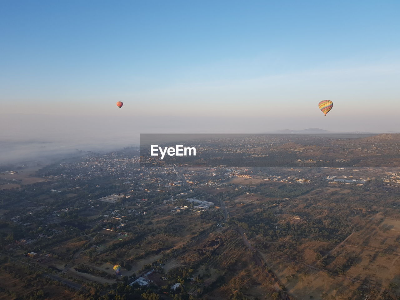 Aerial view of hot air balloon against sky