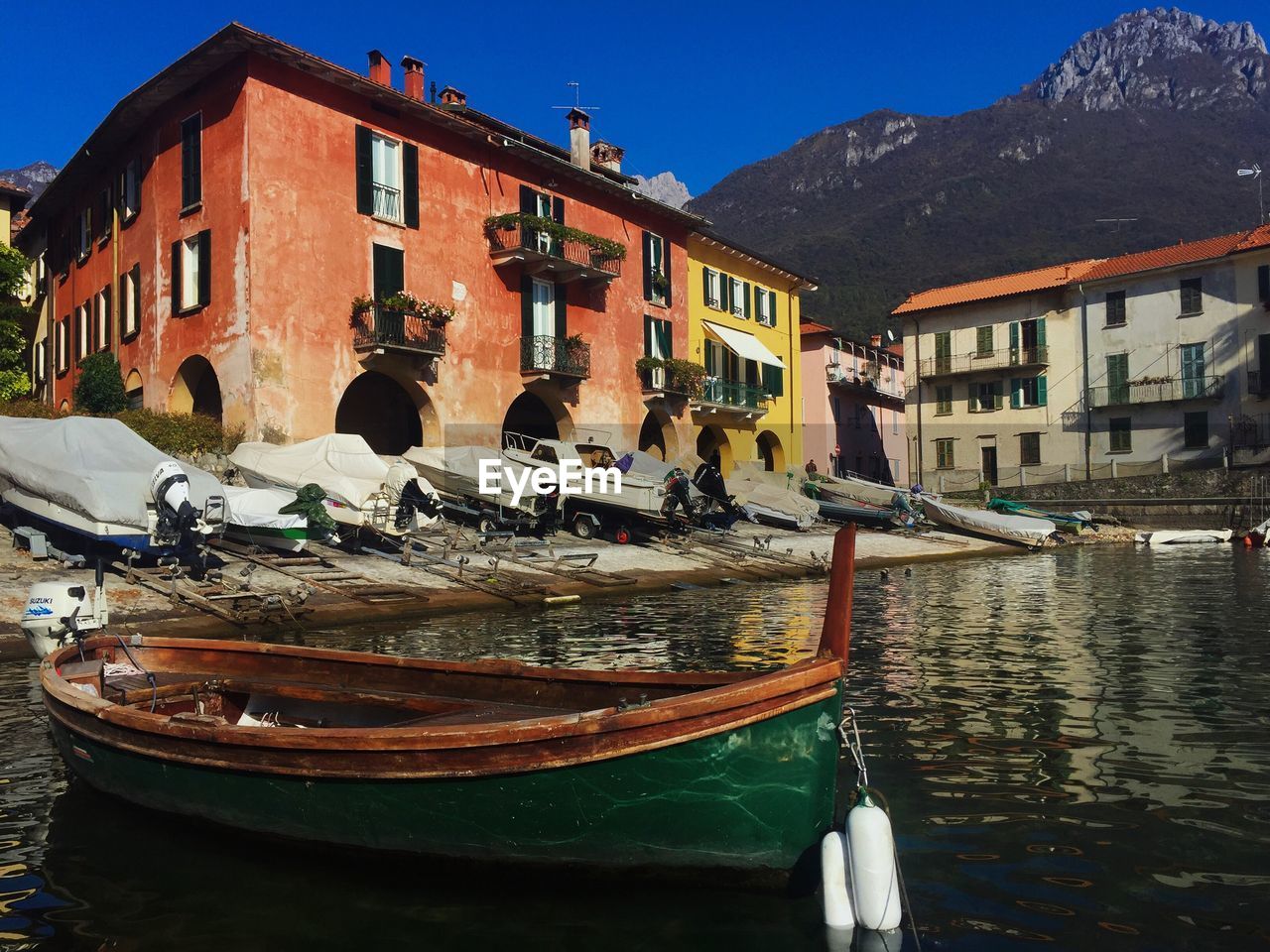 BOATS MOORED ON SHORE