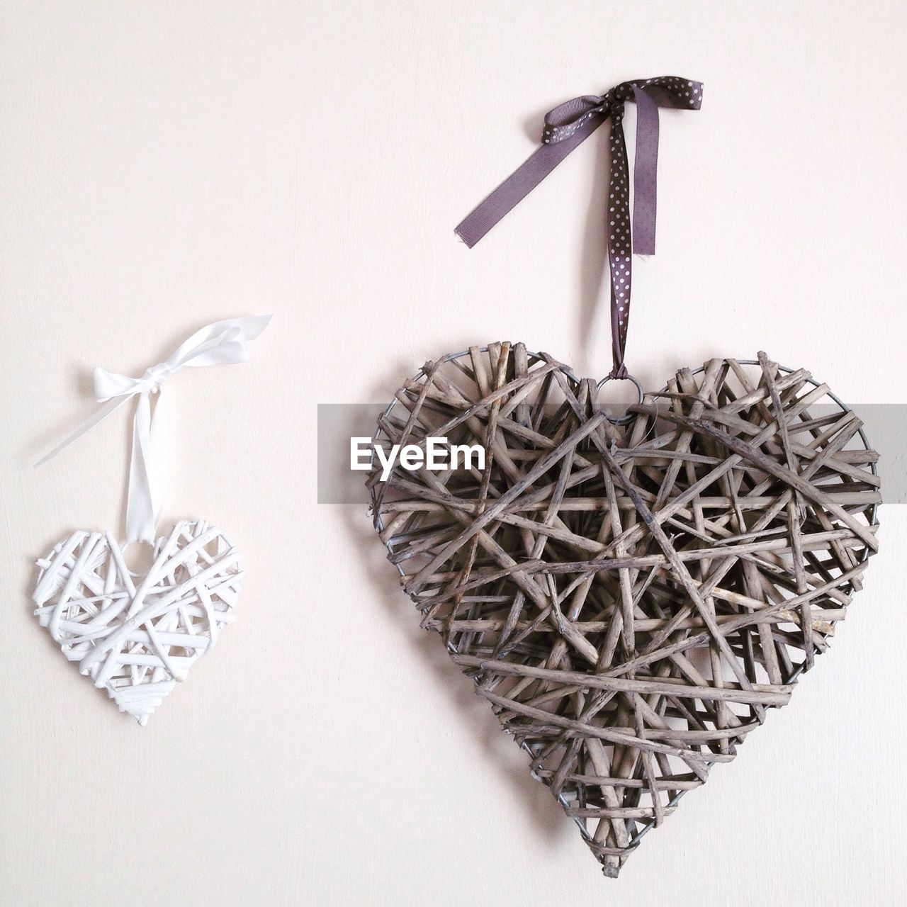 Heart shaped decorations hanging on wall