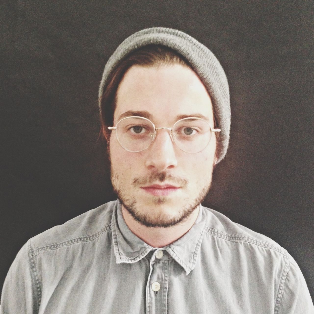 Close-up portrait of serious young man