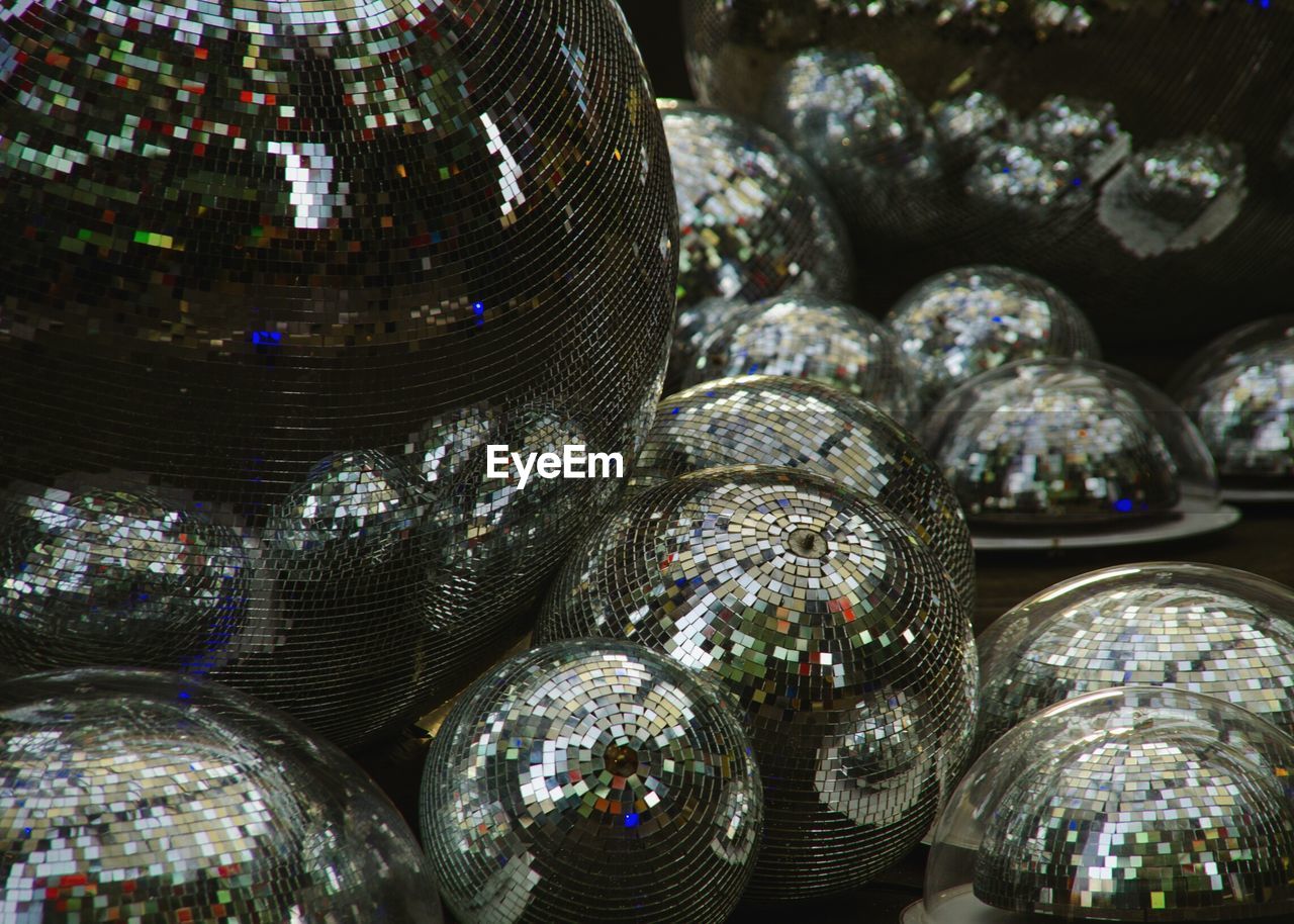 Full frame shot of silver colored disco balls