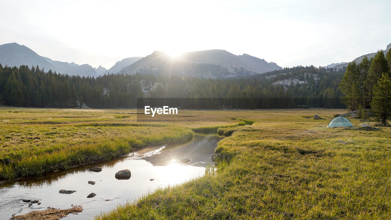 SCENIC VIEW OF LAND AND MOUNTAINS AGAINST SKY