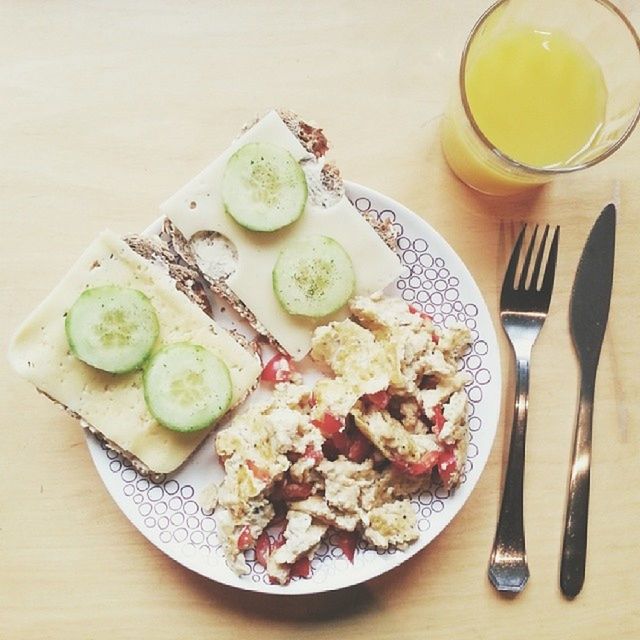 High angle view of morning breakfast on wooden surface