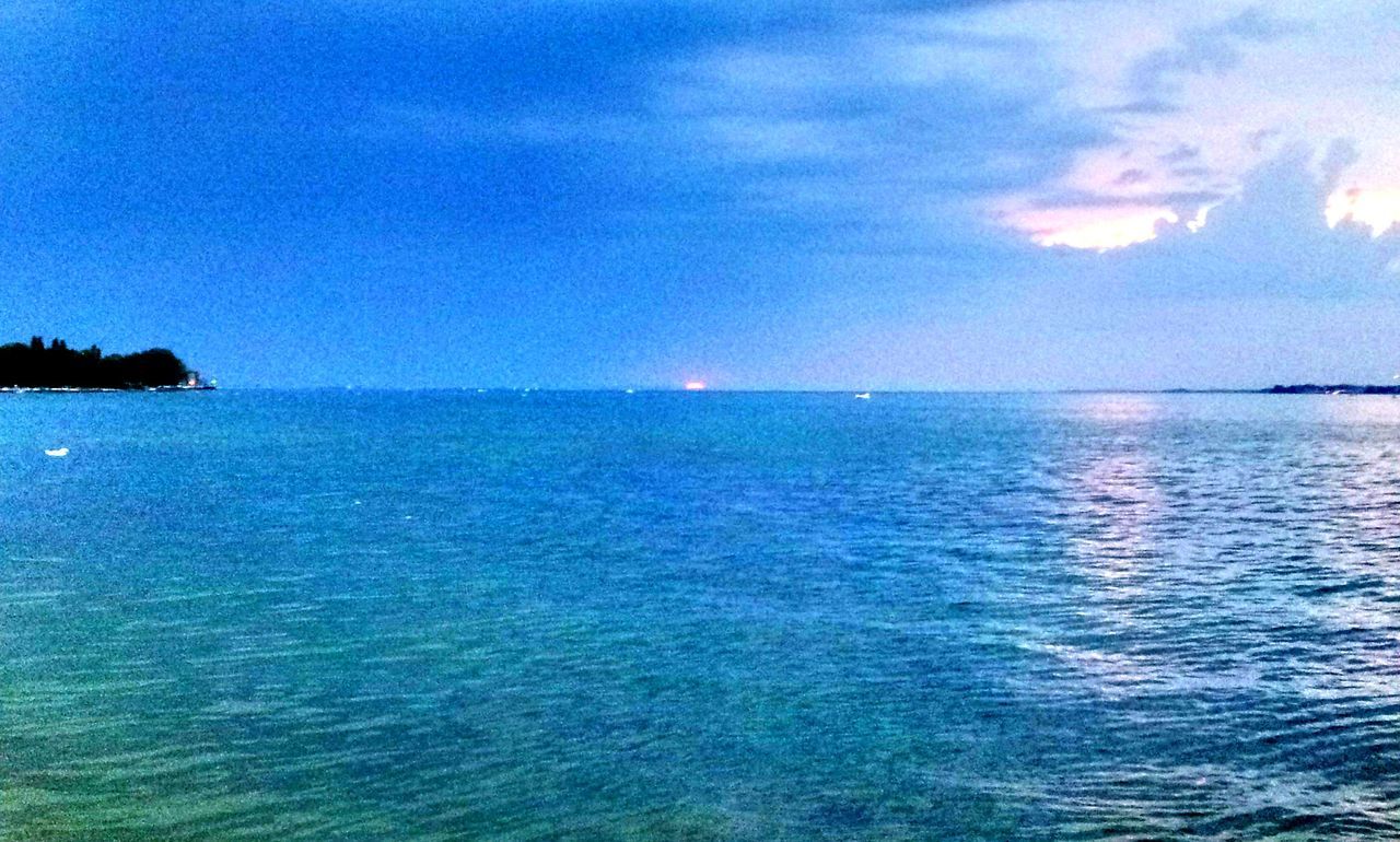 SCENIC VIEW OF SEASCAPE AGAINST SKY