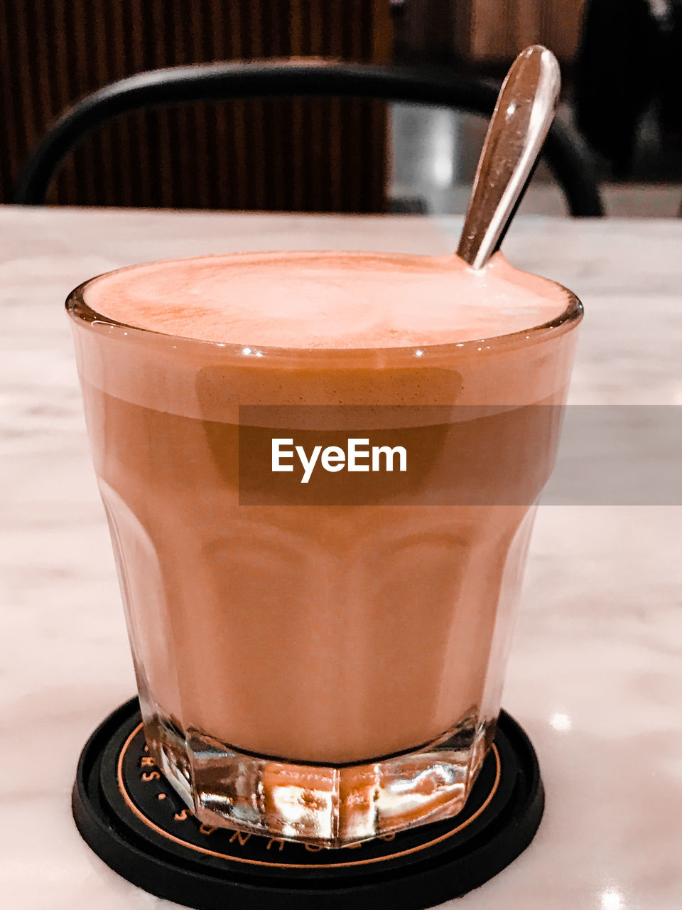 CLOSE-UP OF COFFEE CUP