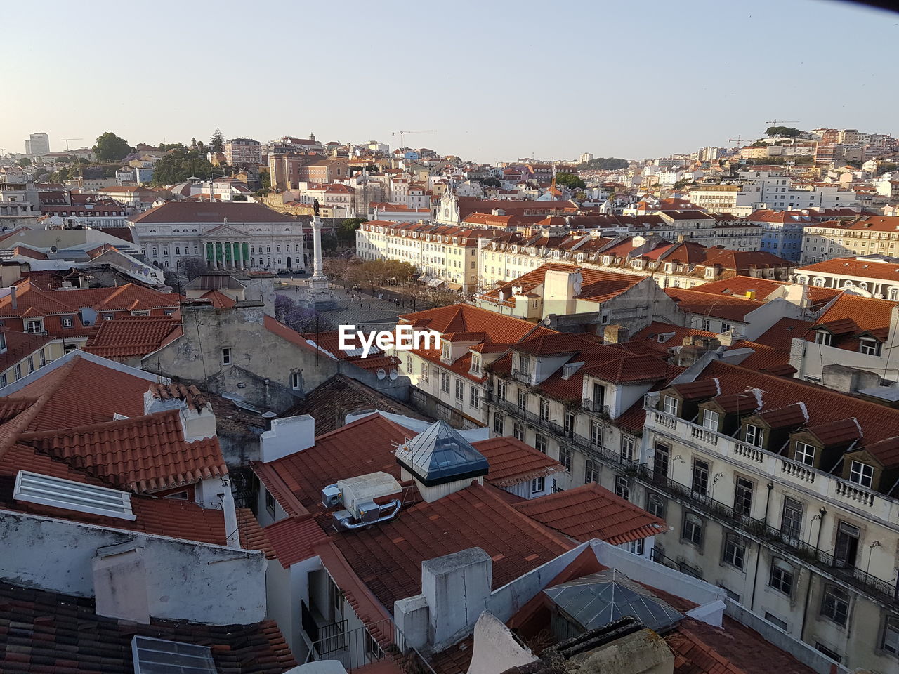 HIGH ANGLE SHOT OF TOWNSCAPE AGAINST SKY